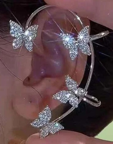 Bijou d'oreille avec papillons