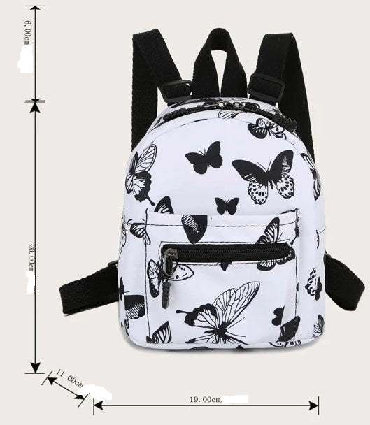 Mini sac à dos noir et blanc motifs papillons